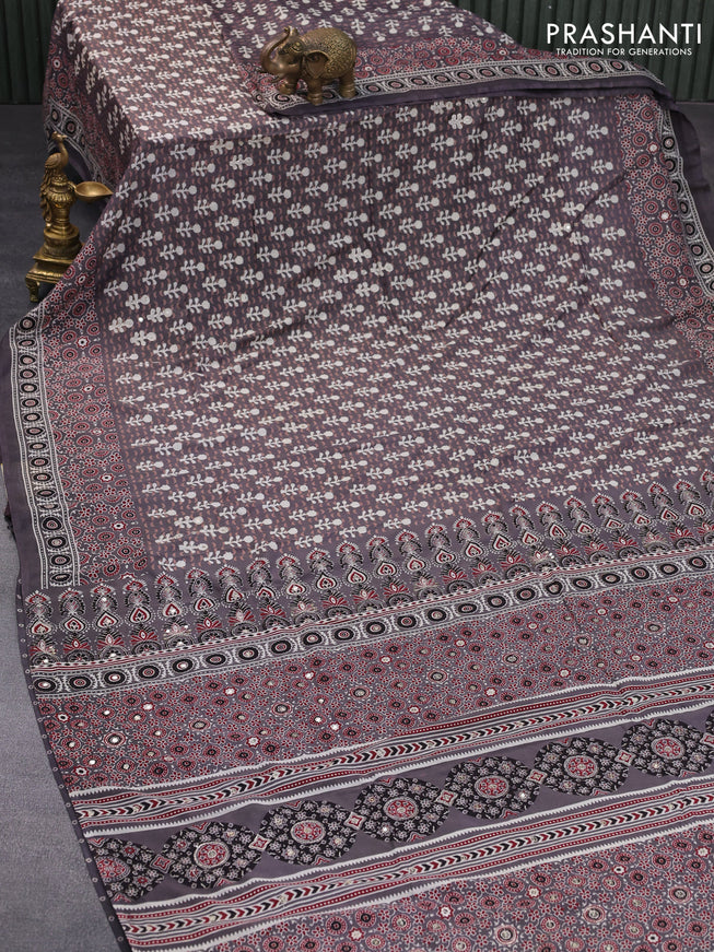 Muslin silk saree grey with allover dabu prints & pita work and ajrakh printed border