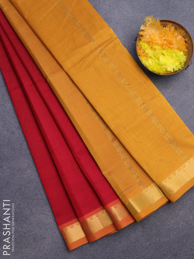 Silk cotton saree kumkum red and mustrad yellow with plain body and zari woven border