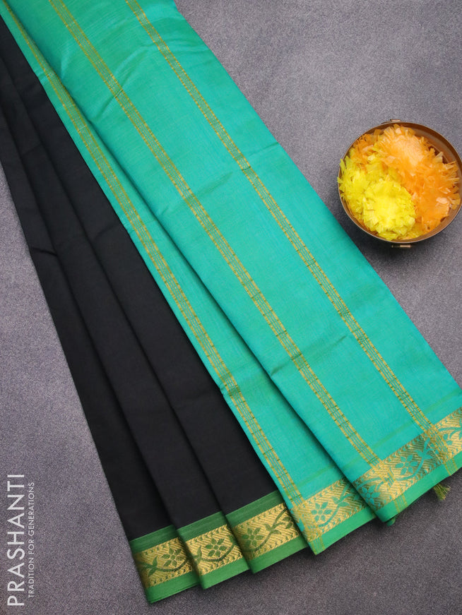 Silk cotton saree black and dual shade of teal bluish green with plain body and zari woven border