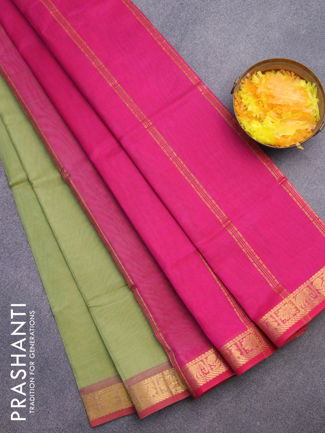 Silk cotton saree pastel green and pink with plain body and zari woven border