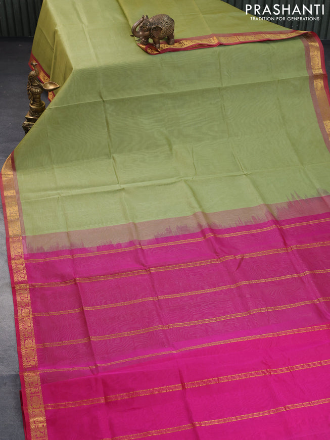 Silk cotton saree pastel green and pink with plain body and zari woven border