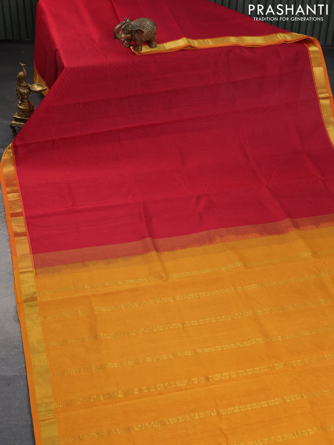 Silk cotton saree maroon and mustard yellow with plain body and zari woven border