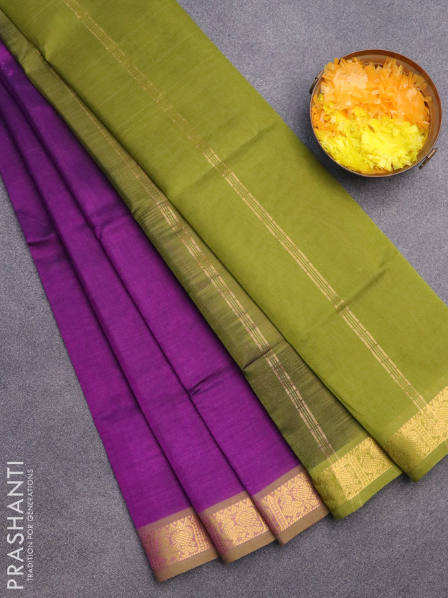 Silk cotton saree purple and mehendi green with plain body and annam zari woven border