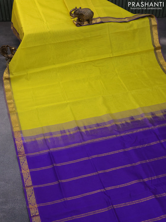 Silk cotton saree lime yellow and violet with plain body and paisley zari woven border