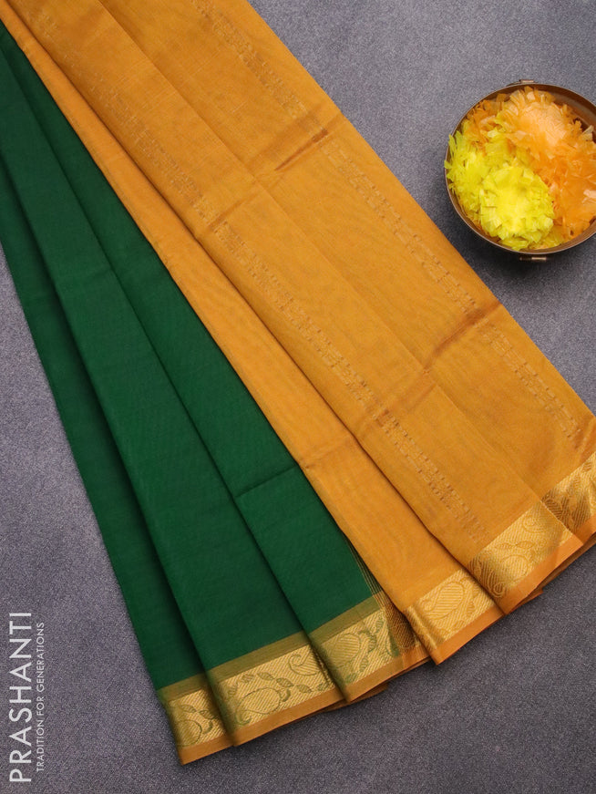 Silk cotton saree green and mustard yellow with plain body and paisley zari woven border