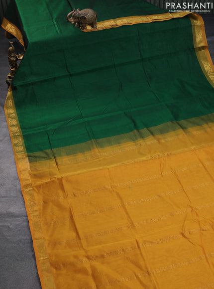 Silk cotton saree green and mustard yellow with plain body and paisley zari woven border