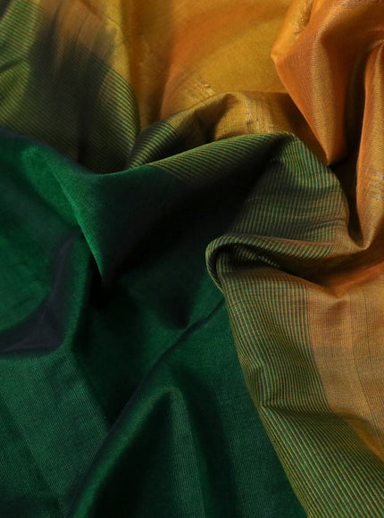 Silk cotton saree green and mustard yellow with plain body and paisley zari woven border