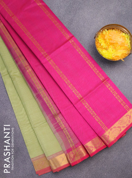 Silk cotton saree pastel green and pink with plain body and paisley zari woven border