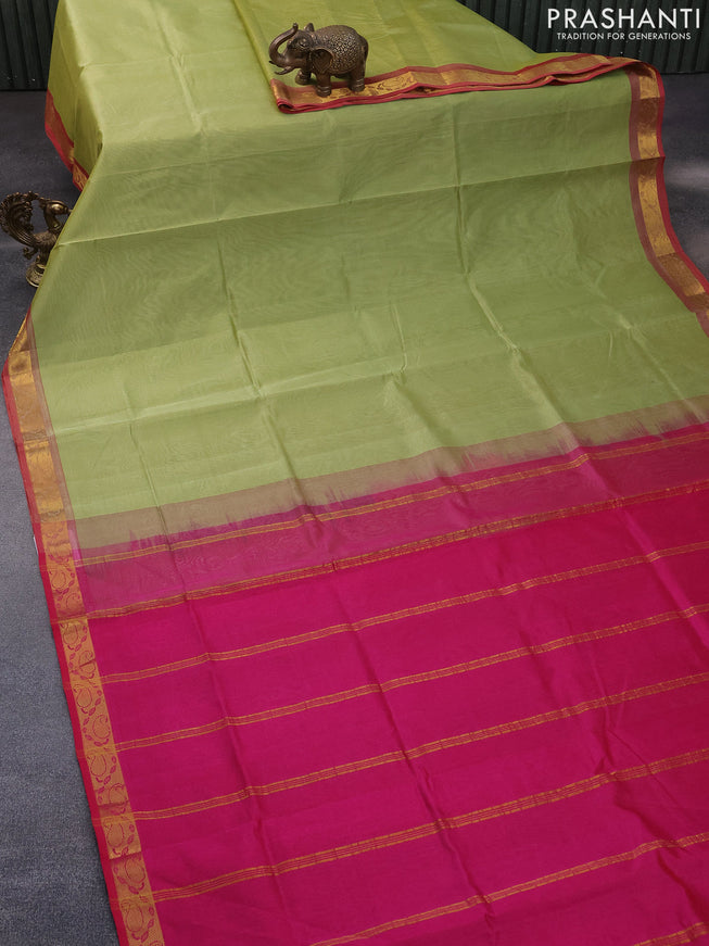 Silk cotton saree pastel green and pink with plain body and paisley zari woven border