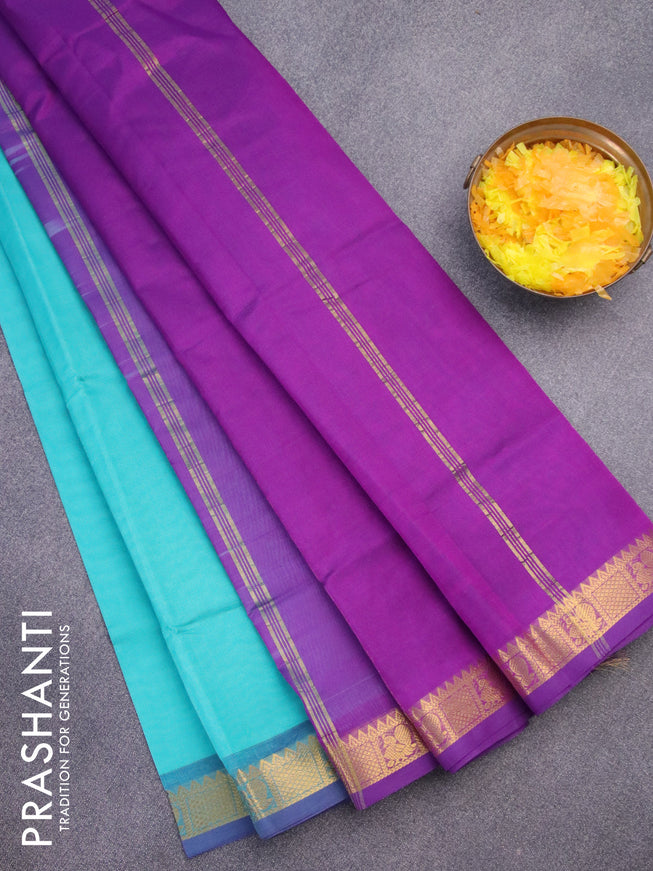 Silk cotton saree teal blue and violet with plain body and annam zari woven border