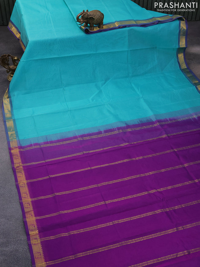 Silk cotton saree teal blue and violet with plain body and annam zari woven border