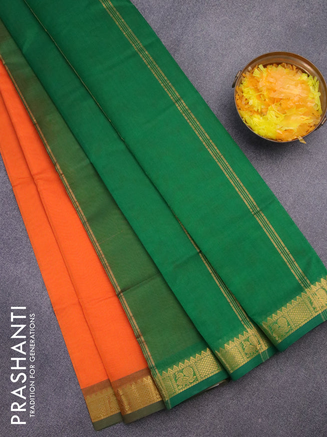 Silk cotton saree orange and green with plain body and annam zari woven border