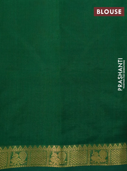 Silk cotton saree orange and green with plain body and annam zari woven border