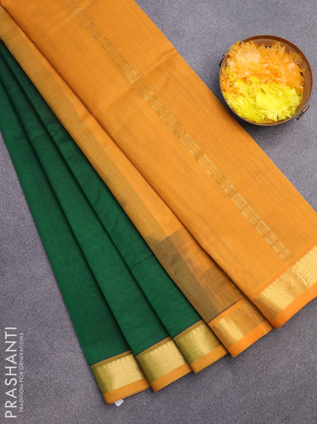 Silk cotton saree dark green and mustard yellow with plain body and zari woven border