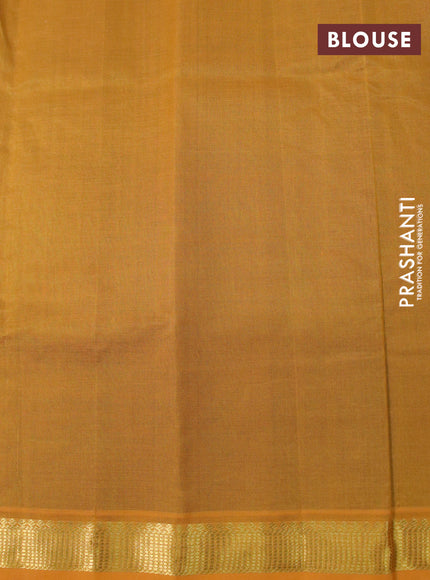 Silk cotton saree dark green and mustard yellow with plain body and zari woven border