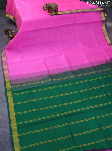 Silk cotton saree candy pink and green with plain body and zari woven border