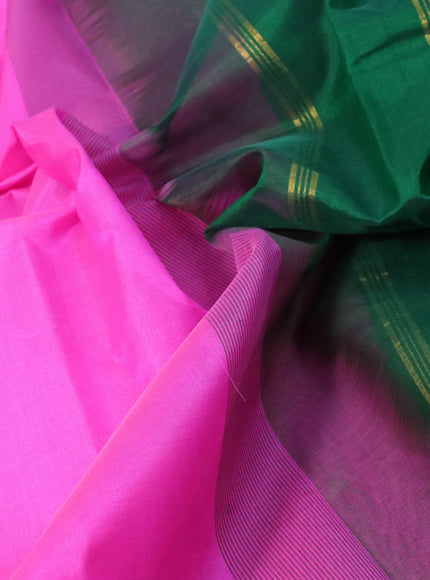 Silk cotton saree candy pink and green with plain body and zari woven border