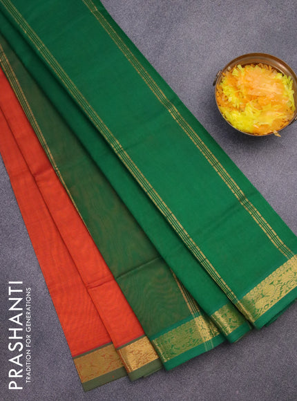 Silk cotton saree rustic orange and green with plain body and annam zari woven border