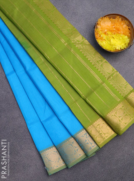 Silk cotton saree cs blue and light green with plain body and zari woven border