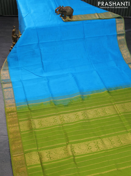 Silk cotton saree cs blue and light green with plain body and zari woven border