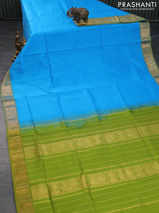 Silk cotton saree cs blue and light green with plain body and zari woven border