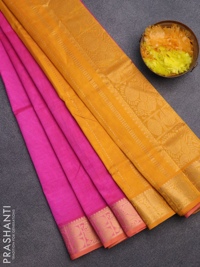 Silk cotton saree pink and mustard yellow with plain body and zari woven border