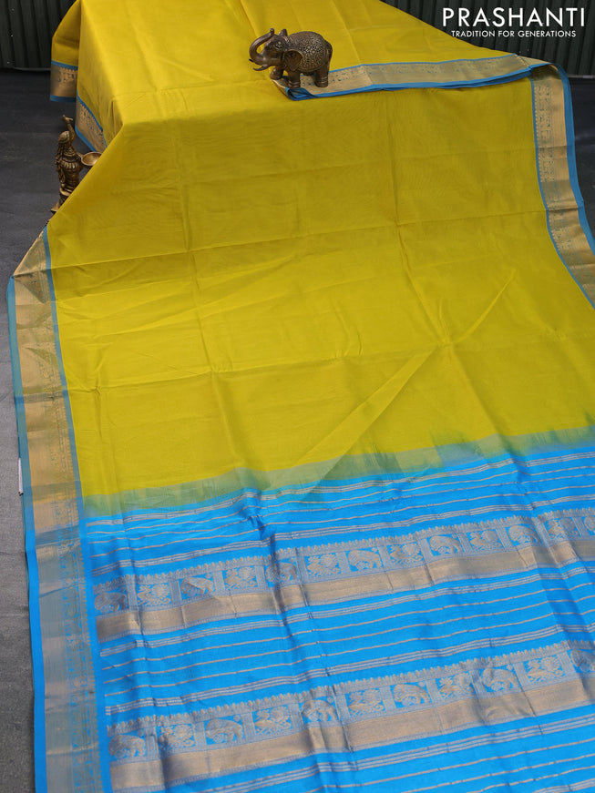 Silk cotton saree lime yellow and light blue with plain body and zari woven border