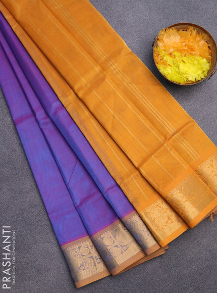 Silk cotton saree dual shade of bluish pink and mustard yellow with plain body and zari woven border