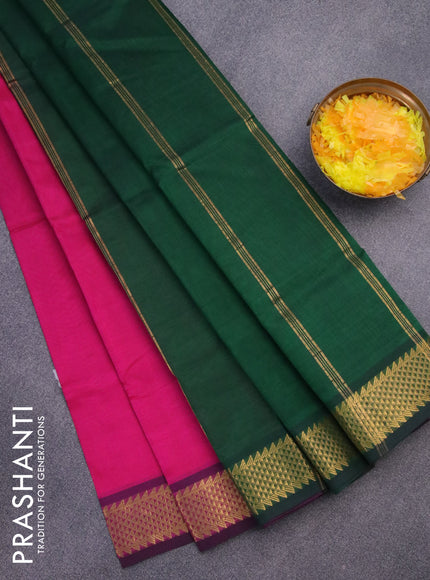 Silk cotton saree dark pink and dark green with plain body and zari woven border