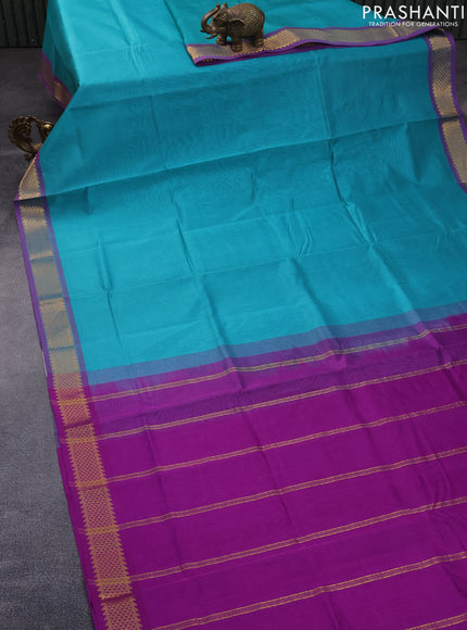 Silk cotton saree teal blue and purple with plain body and zari woven border