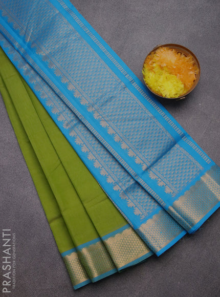 Silk cotton saree light green and cs blue with plain body and zari woven border