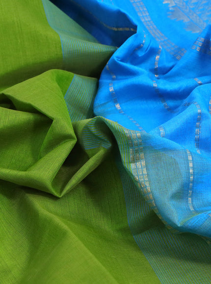 Silk cotton saree light green and cs blue with plain body and zari woven border