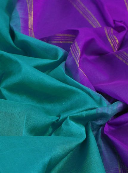 Silk cotton saree teal blue and purple with plain body and peacock zari woven border