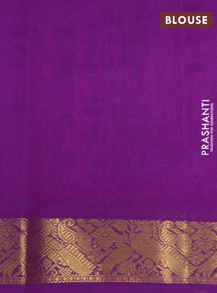 Silk cotton saree teal blue and purple with plain body and peacock zari woven border