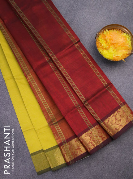 Silk cotton saree lime yellow and maroon with plain body and peacock zari woven border