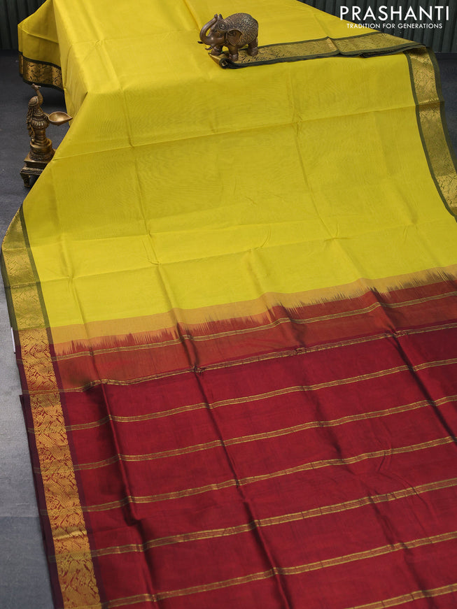 Silk cotton saree lime yellow and maroon with plain body and peacock zari woven border