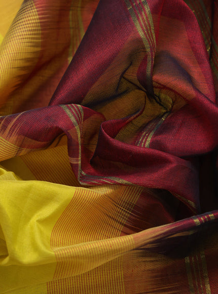 Silk cotton saree lime yellow and maroon with plain body and peacock zari woven border