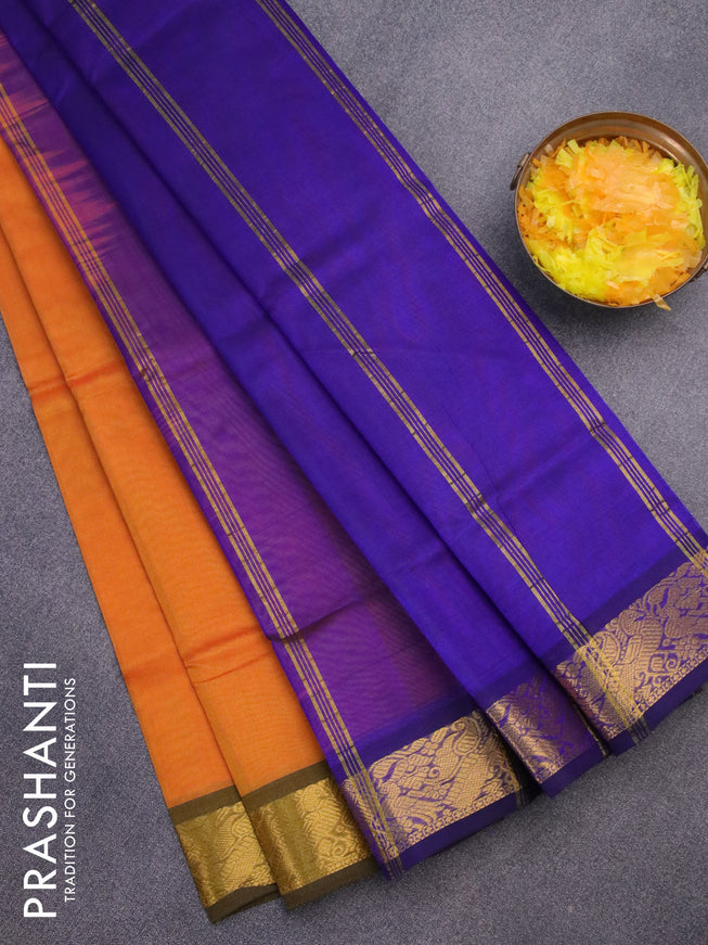 Silk cotton saree mango yellow and blue with plain body and peacock zari woven border