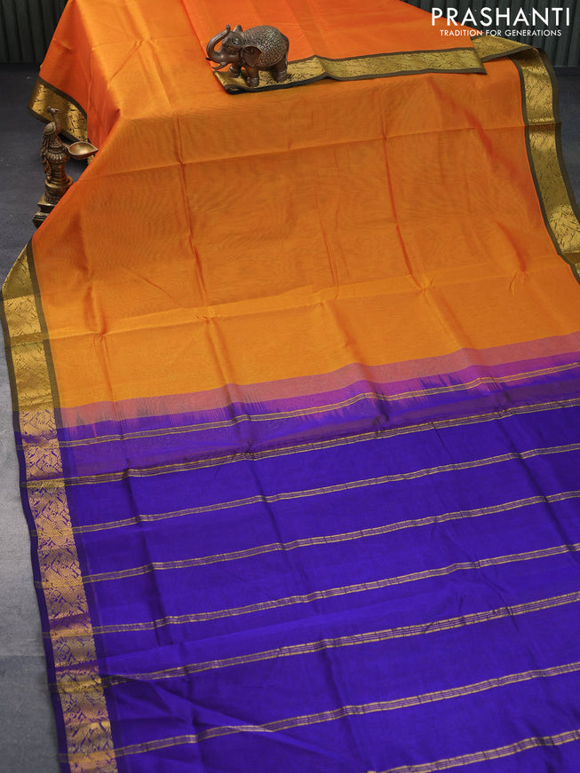 Silk cotton saree mango yellow and blue with plain body and peacock zari woven border