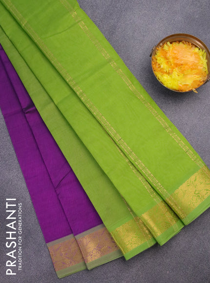 Silk cotton saree purple and light green with plain body and peacock zari woven border