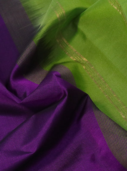 Silk cotton saree purple and light green with plain body and peacock zari woven border