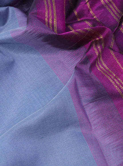 Silk cotton saree grey and purple with plain body and zari woven border