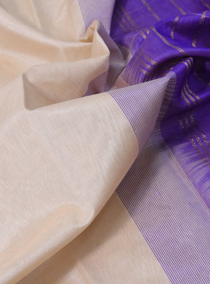 Silk cotton saree cream and blue with plain body and zari woven border