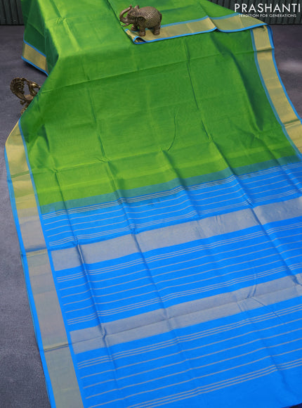 Silk cotton saree light green and cs blue with plain body and zari woven border