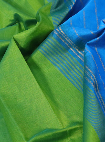 Silk cotton saree light green and cs blue with plain body and zari woven border