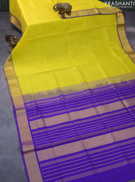 Silk cotton saree lime yellow and blue with plain body and zari woven border