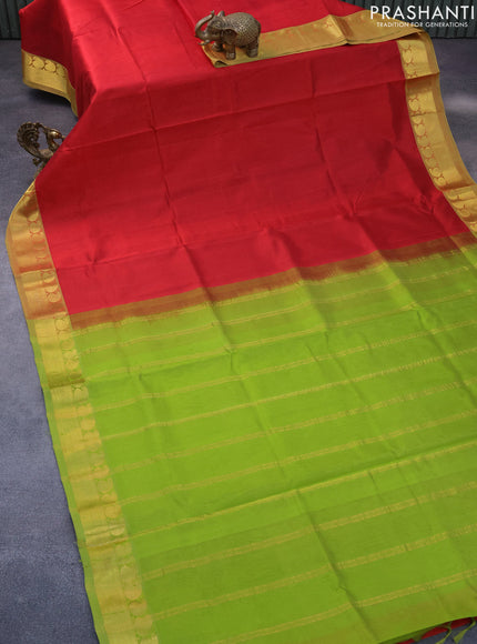 Silk cotton saree maroon and light green with plain body and paisley zari woven border