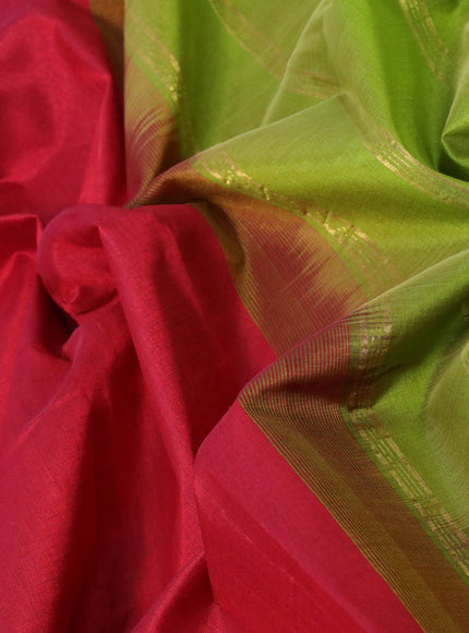 Silk cotton saree maroon and light green with plain body and paisley zari woven border