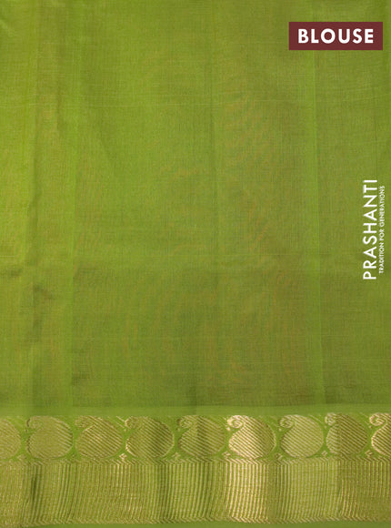 Silk cotton saree maroon and light green with plain body and paisley zari woven border