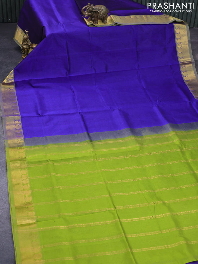 Silk cotton saree blue and light green with plain body and paisley zari woven border